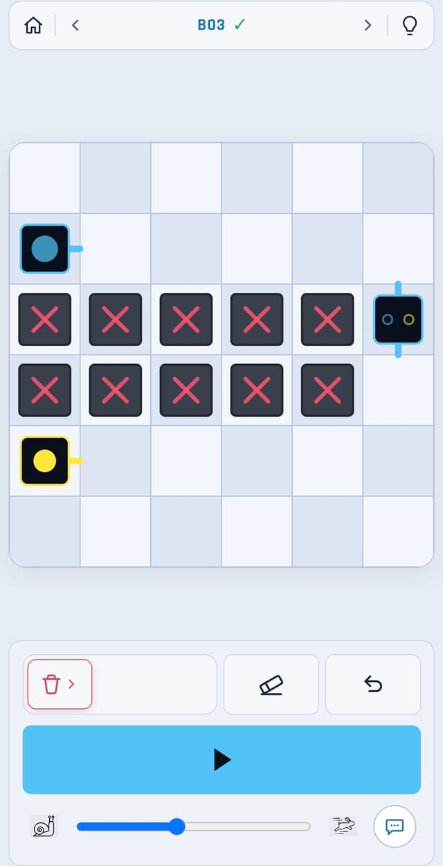 DotTracks level B03 — blue and yellow trains routed past two rows of blocked cells.